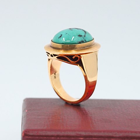 Ring of 14k gold, set with a large turquoise Ring of 14k gold, set with a large turquoise